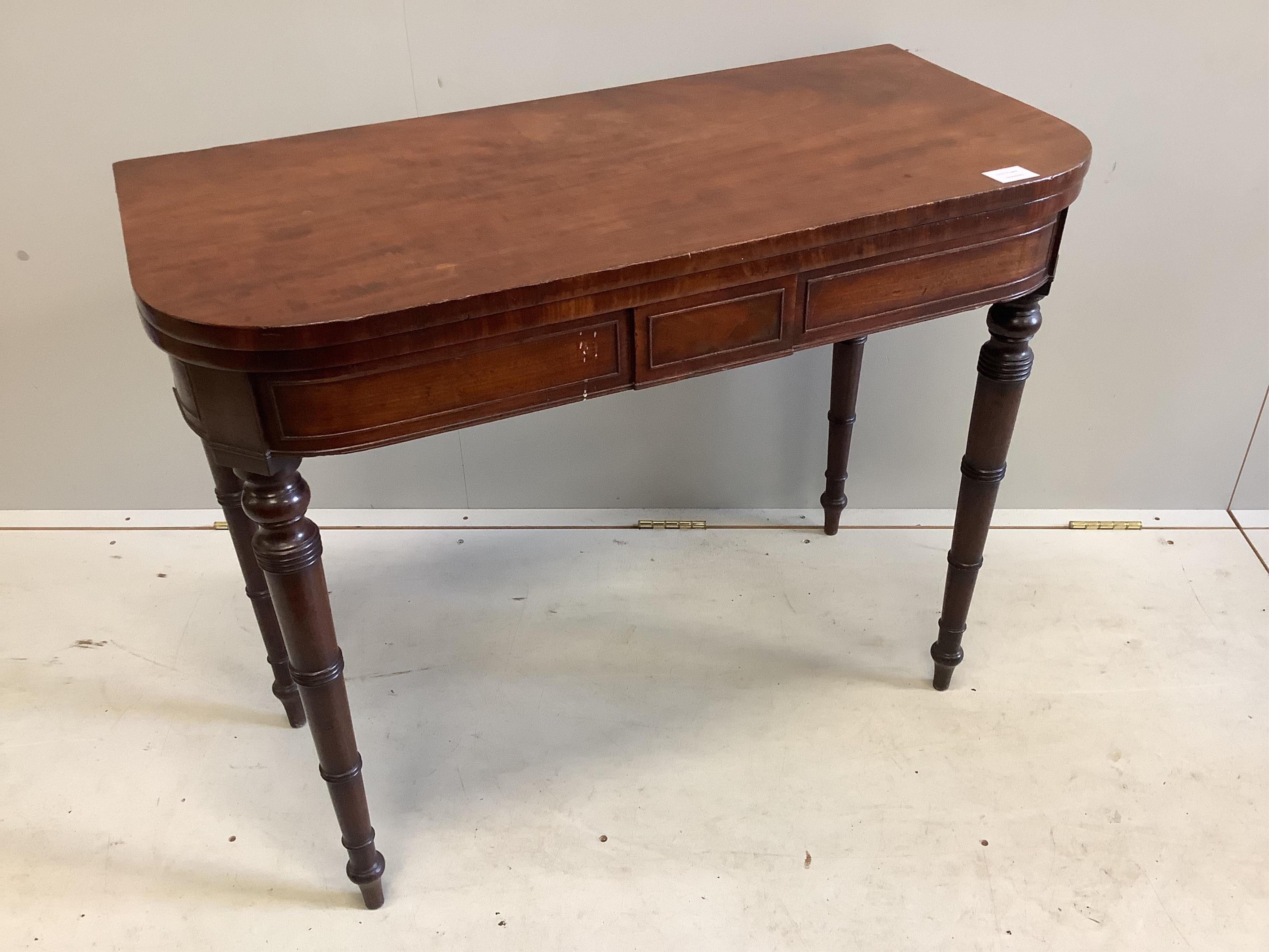 A Regency mahogany folding top card table, width 91cm, depth 44cm, height 73cm. Condition - fair